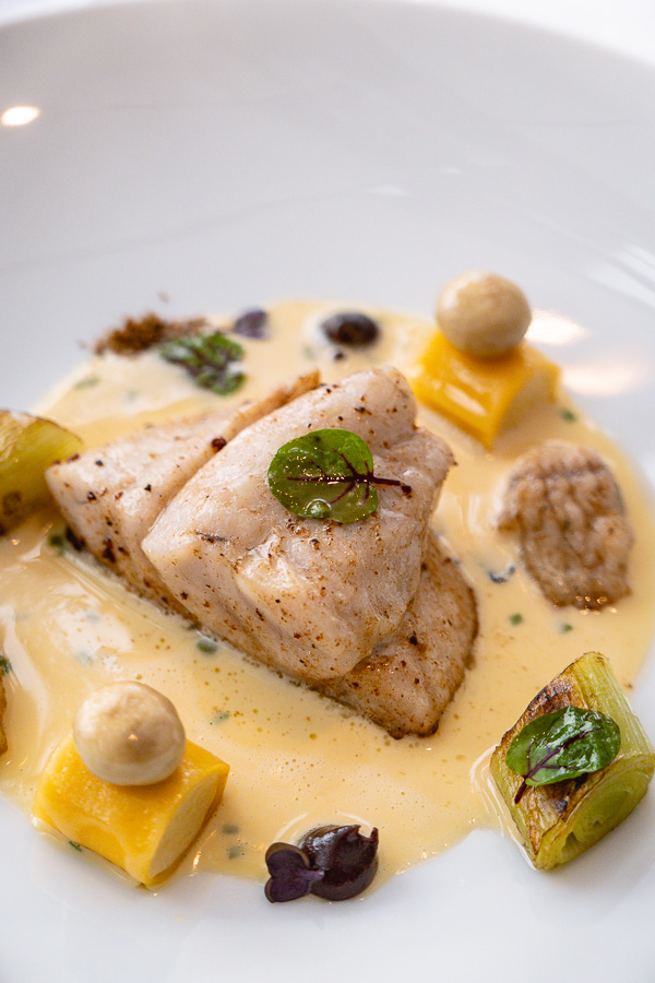 Pike sourced from Guangxi, pan-fried in juniper butter. Lunch at Maison Lameloise Shanghai, Michelin one-star restaurant in Shanghai. Photo by Rachel Gouk.