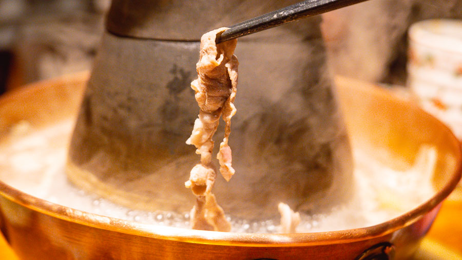 Where to eat lamb hotpot in Shanghai: Lao Men Kuang 老门框, a halal Beijing-style hotpot restaurant in Shanghai. Photo by Rachel Gouk @ Nomfluence.