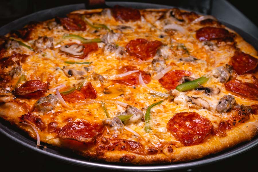 ZUP Pizza Bar is a restaurant and bar in Shanghai that does Chicago-style thin crust tavern pizzas. Photo by Rachel Gouk @ Nomfluence.