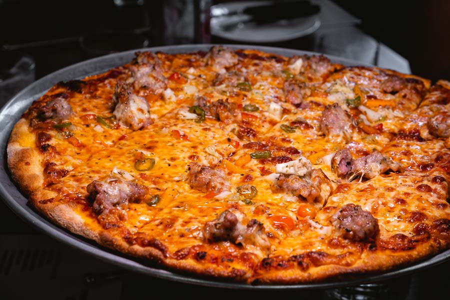 ZUP Pizza Bar is a restaurant and bar in Shanghai that does Chicago-style thin crust tavern pizzas. Photo by Rachel Gouk @ Nomfluence.