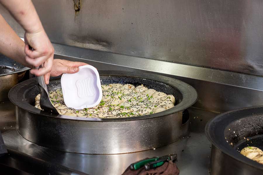 The best Chinese snack foods in Shanghai: Where to eat Guotie and Shengjian Bao. Photo by Rachel Gouk @ Nomfluence.